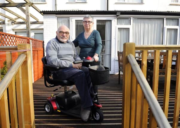 Anthony Langford with his wife Rula on the decking which enables his mobility at his Cosham home