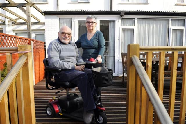 Anthony Langford with his wife Rula on the decking which enables his mobility at his Cosham home