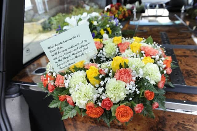 This wreath for Gosport football coach Ronnie Williamson was destroyed - while his funeral was still taking place.