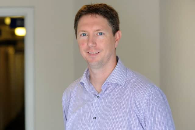 Dr Andrew Whittamore.