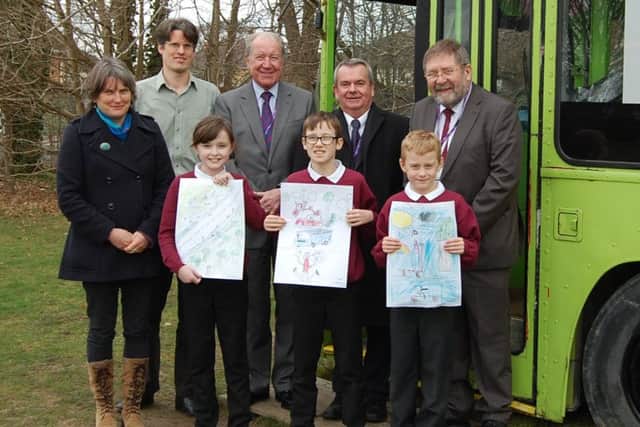 Jean Everitt from Friends of the Earth, Cllr Trevor Cartwright, Cllr Rob Humby, Cllr Graham Burgess, Jean MacGrory from Hampshire County Council with Callum Manson, Thomas Houghton and Skye Maccoll from Rowner Junior School. Picture: David George