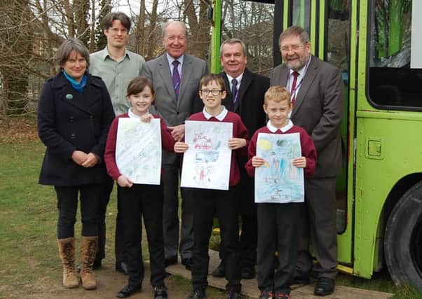 Jean Everitt from Friends of the Earth, Cllr Trevor Cartwright, Cllr Rob Humby, Cllr Graham Burgess, Jean MacGrory from Hampshire County Council with Callum Manson, Thomas Houghton and Skye Maccoll from Rowner Junior School. Picture: David George
