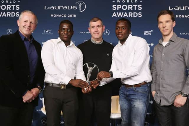 From left: Laureus Academy chairman Sean Fitzpatrick, project leader Ade Akande, ACN CEO Gary Stannett, project leader Ibrahim Kanu, and Benedict Cumberbatch