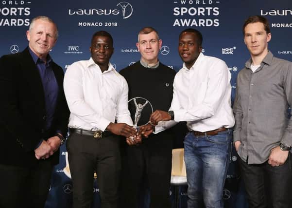 From left: Laureus Academy chairman Sean Fitzpatrick, project leader Ade Akande, ACN CEO Gary Stannett, project leader Ibrahim Kanu, and Benedict Cumberbatch