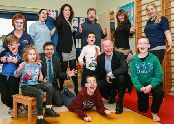 Pictured with staff and pupils from the centre are Paul Duckworth and Samantha Trivino of Smith and Williamson, Simon Rhodes of Trethowans, Gary Jeffries of Hughes Ellard and Joanne Whatley of Santander