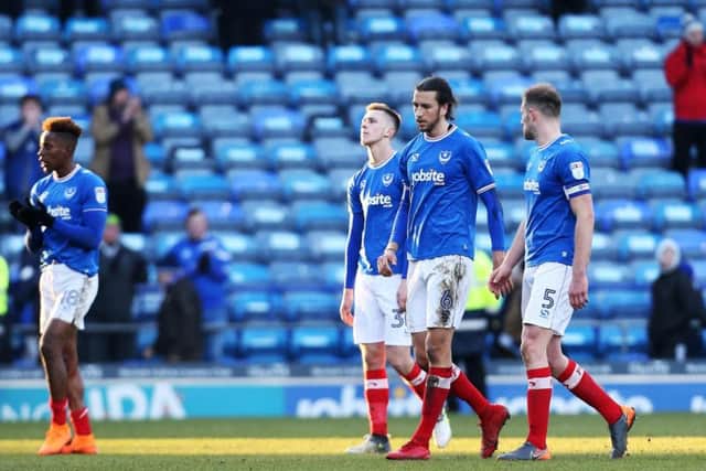 From left to right: Jamal Lowe, Adam May, Christian Burgess and Matt Clarke after Pompey's loss to Blackpool. Picture: Joe Pepler