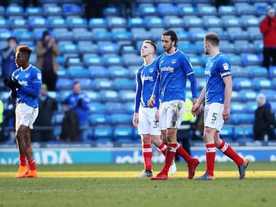 From left to right: Jamal Lowe, Adam May, Christian Burgess and Matt Clarke after Pompey's loss to Blackpool. Picture: Joe Pepler
