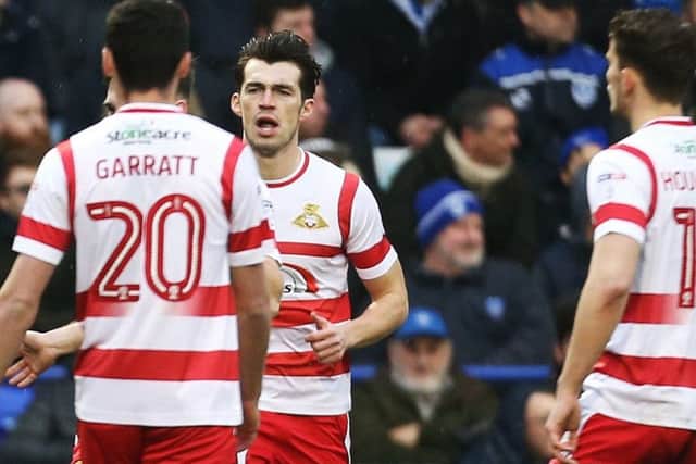 John Marquis netted for Doncaster but they lost to Michael Smith's Rotherham