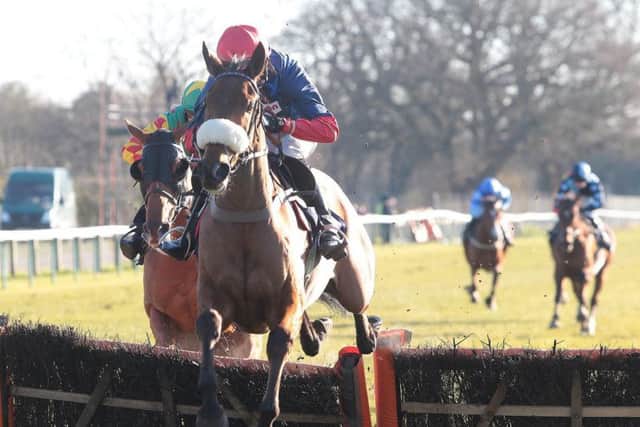 Old Guard and Harry Cobden on their way to National Spirit Hurdle success. Picture: Fontwell Park