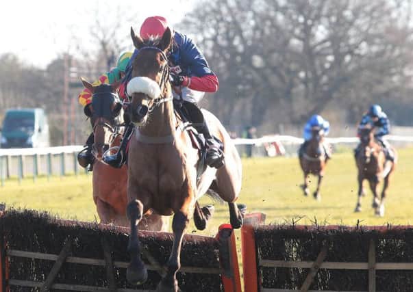 Old Guard and Harry Cobden on their way to National Spirit Hurdle success. Picture: Fontwell Park