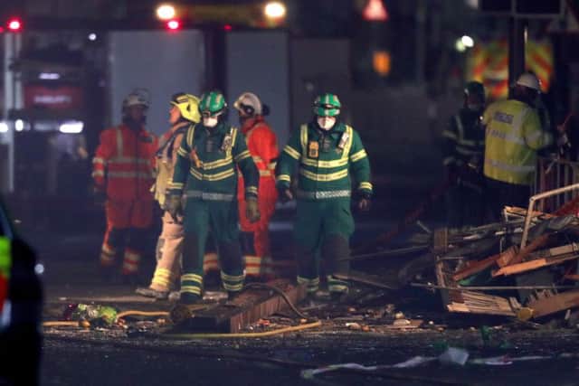 Emergency personnel at the scene on Hinckley Road in Leicester after a building exploded. Photo: Aaron Chown/PA Wire POLICE_Explosion_222744.JPG