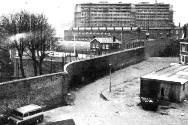 A look over the dockyard wall when the road was a right of way from Portsea to Landport along Flathouse Road.