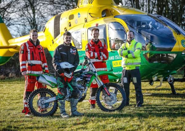 James Hillier with a crew from the Hampshire and Isle of Wight Air Ambulance Critical Care Team promoting bike safety on the road. 

Picture by Hampshire and Isle of Wight Air Ambulance
