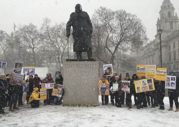 The group who travelled to London laid yellow roses at the Winston Churchill statue
