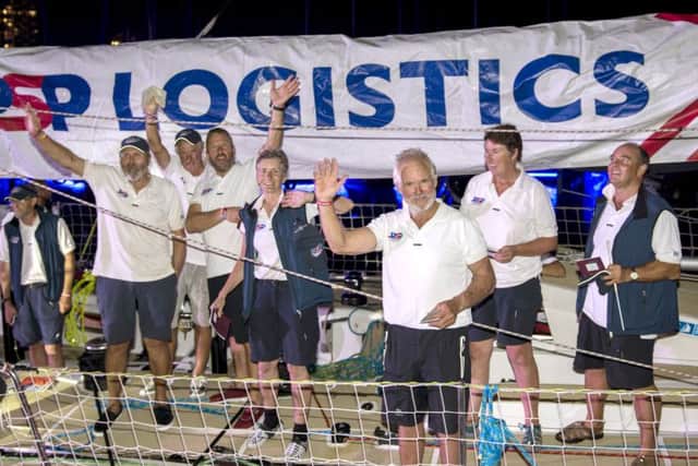 PSP Logistics team celebrate the first place, after arriving at the Clipper Round the World yacht race stopover in Sanya, on the island of Hainan in Southern China