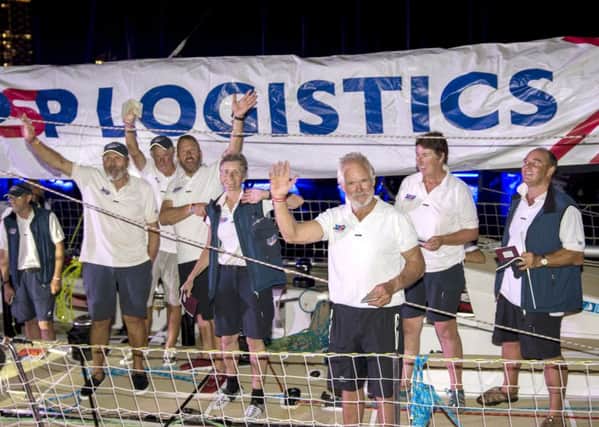 PSP Logistics team celebrate the first place, after arriving at the Clipper Round the World yacht race stopover in Sanya, on the island of Hainan in Southern China