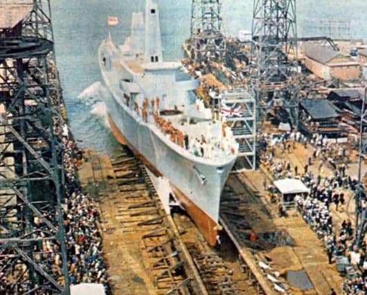 The last complete warship to be built in the dockyard, HMS Andromeda slips into the water May 24, 1967.