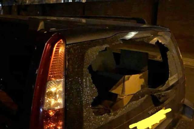 Thugs smashed the window of the charity's car, stealing clothes from the homeless and a laptop used by Helping Hands Portsmouth