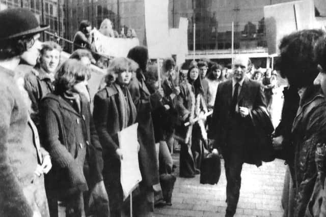 People arriving at Portsmouth Guildhall had to walk through lines of picketing students, protesting over grants while the polytechnic governors' meeting was being held inside