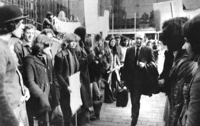 People arriving at Portsmouth Guildhall had to walk through lines of picketing students, protesting over grants while the polytechnic governors' meeting was being held inside