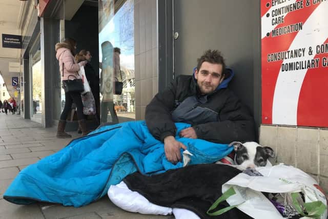 Rough sleeper Justin Bale, 31, and his dog Acer. 
Picture: Byron Melton
