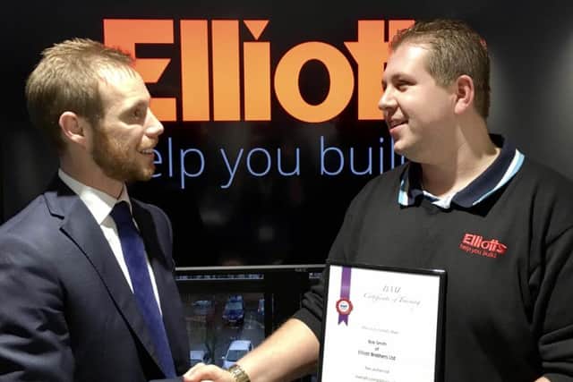 Portsmouth branch manager, Bobby Smith Jnr, receives his BMF Diploma from Elliotts managing director, Tom Elliott