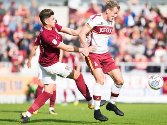 Bradford striker Charlie Wyke, right