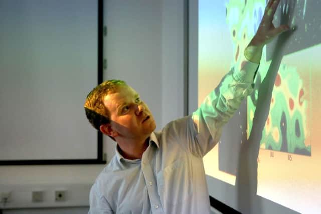 Dr David Bacon demonstrating the content of the Dark Matter Map