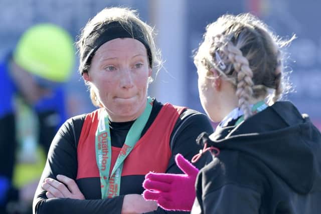 Kelly Stokes chats with Victoria Ayriss after the race. Picture: Neil Marshall
