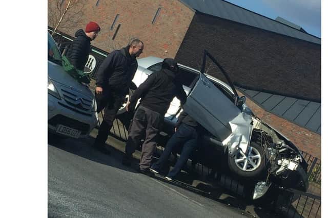 The Ford Focus after it hit the railings outside Emsworth Baptist Church, off North Street. Picture: Samantha Knight