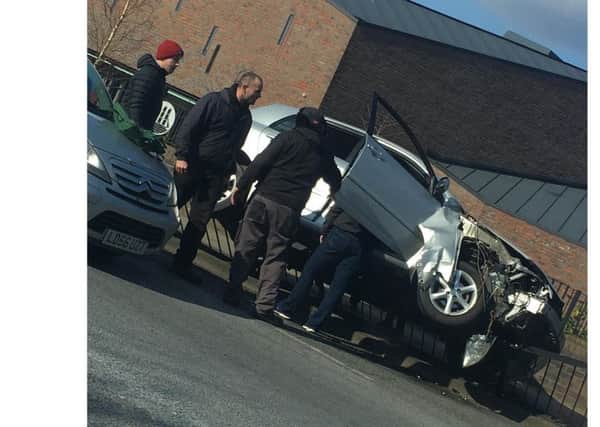 The Ford Focus after it hit the railings outside Emsworth Baptist Church, off North Street. Picture: Samantha Knight