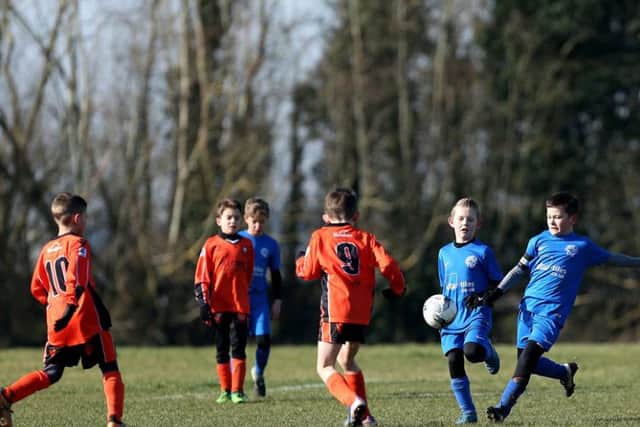 AFC Portchester and Fleur de Lys Victory in action at under-nines level. Picture: Chris Moorhouse