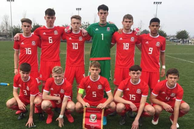 Pompey Academy talent Harvey Rew, front left, made his debut for Wales in Greece. Picture: FA Wales