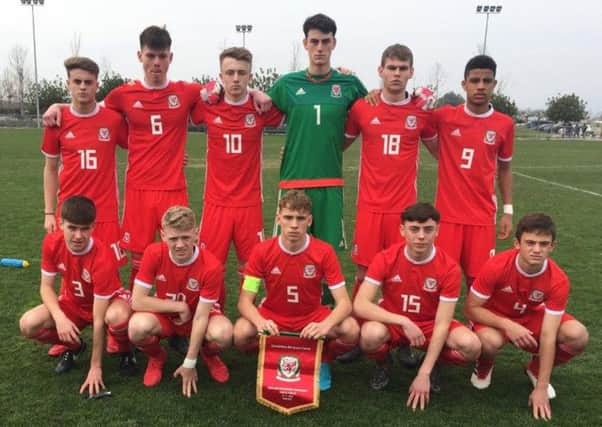Pompey Academy talent Harvey Rew, front left, made his debut for Wales in Greece. Picture: FA Wales