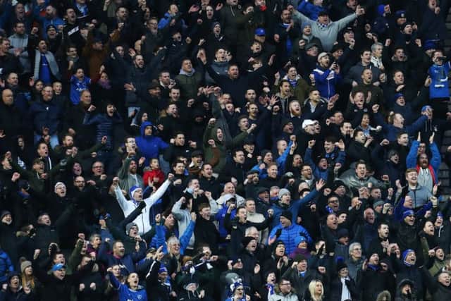 Can you spot them? Stuart O'Keefe and Christian Burgess were among the 6,257 Pompey fans at Stadium MK. Picture: Joe Pepler