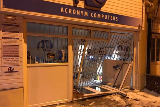 The scene outside Acronym Computers after a botched break-in of the store TIG81b_BZatFmc7-qtbW