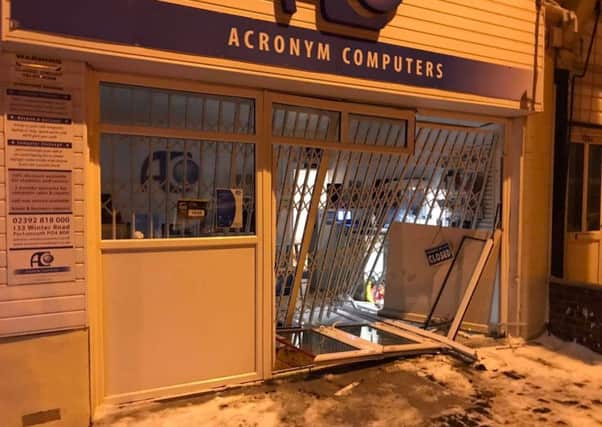 The scene outside Acronym Computers after a botched break-in of the store TIG81b_BZatFmc7-qtbW