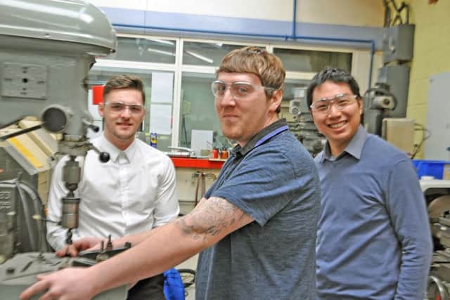 Apprentices Todd Green, Shane Hutton and graduate engineer Jack Lee at Barnbrook Systems