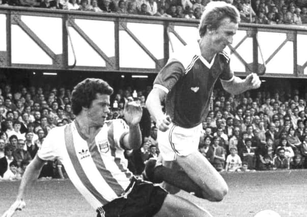 Alan Rogers in action against Brentford in 1980 Picture: Pompey History Society Archive