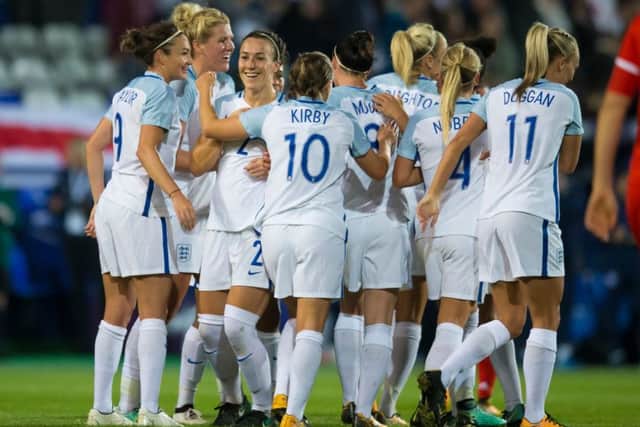 Lucy Bronze centre left celebrates with teammates after scoring after scoring during the England v Russia 2019 FIFA womens World Cup qualifiers match. Held at Prenton Park, Birkenhead. Picture: Jon Super