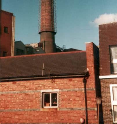 The north chimney in 1981. Geoff Witte says: In the foreground is the old bonded warehouse used by the Mary Rose Trust to store goods and conserve effects.