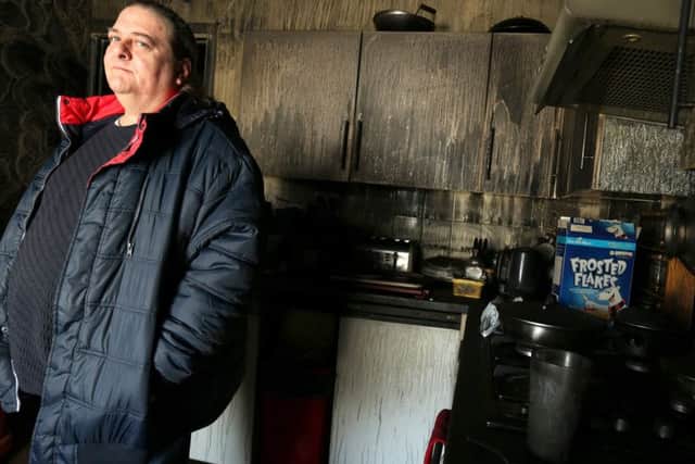 Paul Fewings in the kitchen after the fire at his flat in New Road, Buckland     Picture: Chris Moorhouse