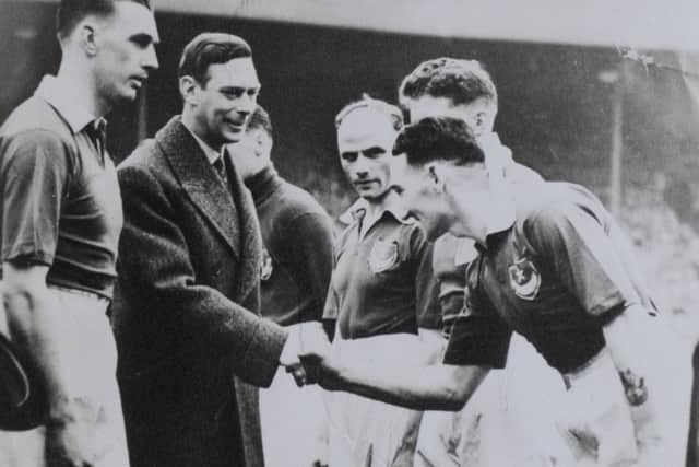 Lewis Morgan meeting King George VI at the FA Cup final in 1939. PPP-170427-115858001