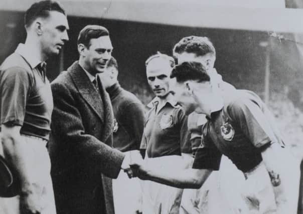 Lewis Morgan meeting King George VI at the FA Cup final in 1939. PPP-170427-115858001