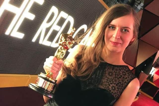 Rebecca Harris clutching the Oscar for The Silent Child