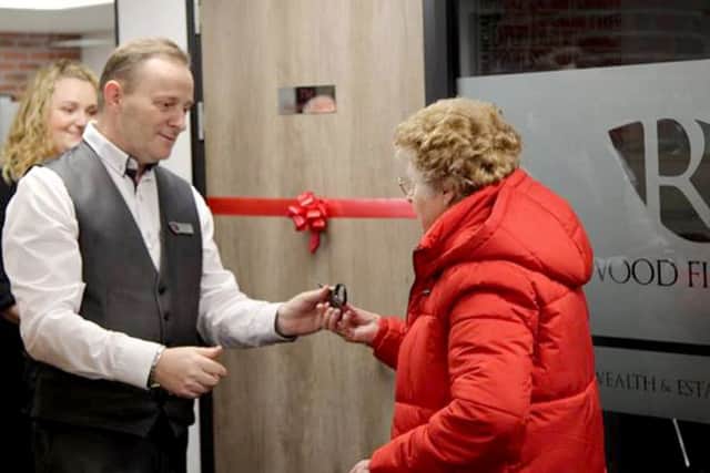 Steve Blofield with Sylvia Webster opening the Webster Suite.
