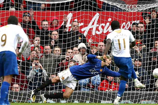 Sulley Muntari scores from the spot for Pompey at Manchester United.