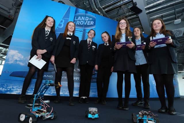 Girls control robots from the Faculty of Technology at the University of Portsmouth. Picture: Chris Moorhouse