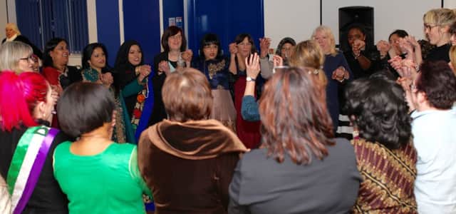 Circle dancing at Fratton Park for International Women's Day