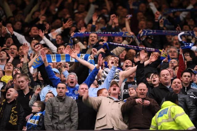 Pompey fans celebrate success at Old Trafford in 2008. Picture: Steve Reid
